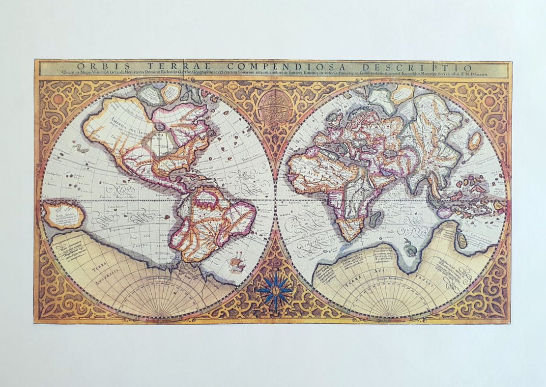 Replica of the world map with two orange balls