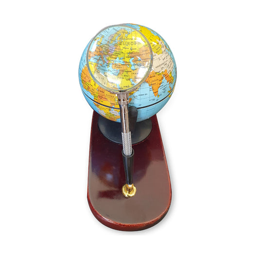 Desktop globe with wooden base and magnifying glass